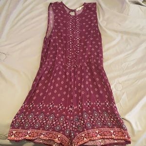 Pink romper with flower designs